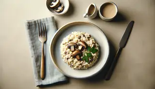 A plate of vegan Mushroom Risotto with a sprig of fresh parsley on a simple, inviting table setting.