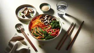 Realistic image of a vibrant Asian-inspired vegan meal with shiitake mushrooms, carrots, kale, red bell peppers, green onions, and sesame seeds in a modern bowl, with chopsticks and water glass.