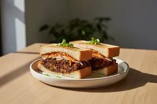 Vegan Miso-Tempeh Sando on Shokupan bread with pickled vegetables, elegantly plated in soft morning light.