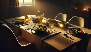 Tranquil dusk scene of a beautifully prepared vegan buttery vegetable quinoa dinner, minimalist table setting in soft light ambiance