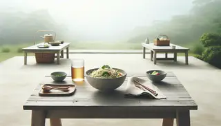 Japanese Chilled Noodle Salad centerpiece on a serene picnic table, minimalist presentation exuding freshness and vegan essence