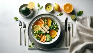 Vibrant citrusy vegan dinner with soft tofu, avocado, and fresh garnishes on a clean table setting