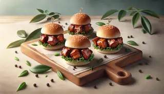 Artistic image of BBQ Jackfruit Sliders on a stylish table setting, garnished and inviting, perfect for a plant-based feast