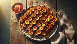 Vegan BBQ Plantain Skewers on a wooden table with smoked paprika, a side of dipping sauce, under natural sunlight.